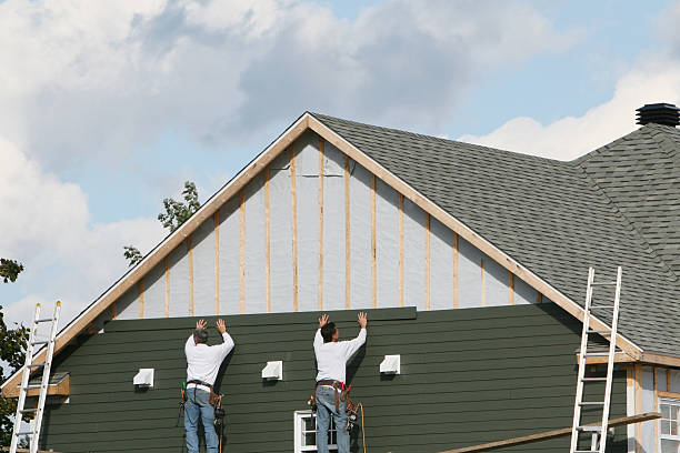 Professional Siding Repair technician working in Potomac, MD